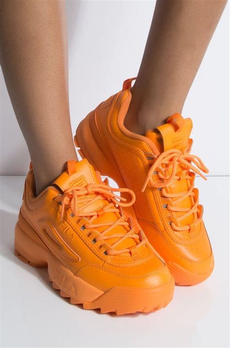 women's white sneakers with orange